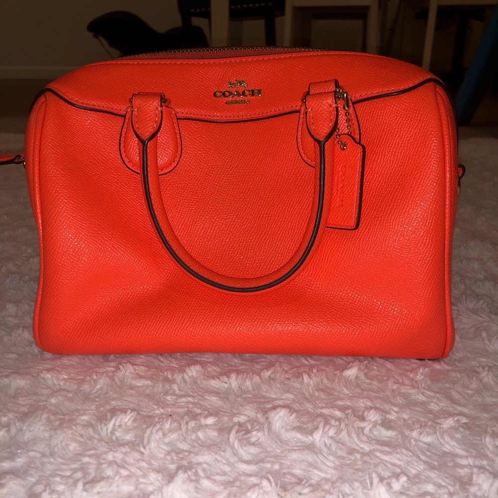 Neon orange COACH purse